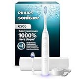 Philips Sonicare 6500 Series Electric Toothbrush - Next-Generation Sonicare Technology, Pressure Sensor, 9 Brushing Settings, SmarTimer, BrushPacer, 21-Day Runtime, Travel Case, White, HX7410/10